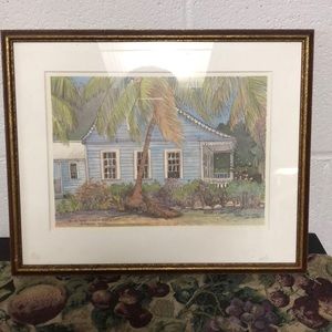 Framed watercolor and pen printed picture.